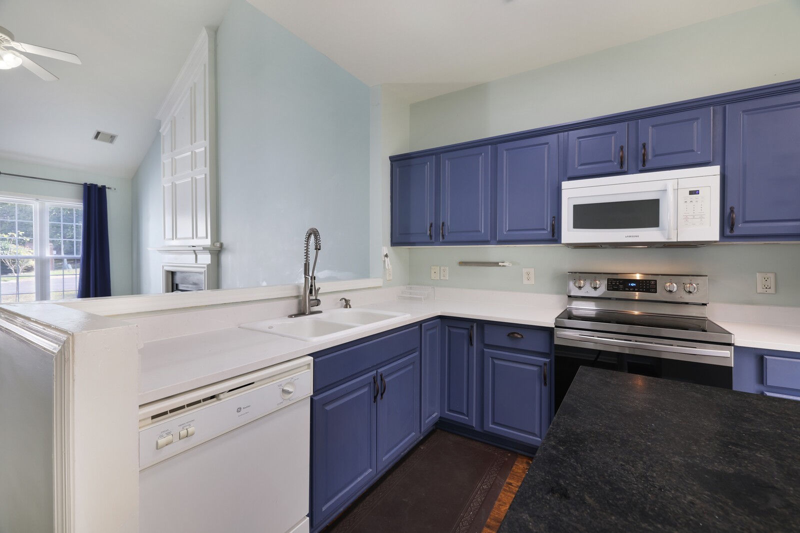 3405 Old Anderson Road, Unit 231 Antioch, TN 37013 - Photo 6 of 18 a kitchen with appliances a sink and cabinets