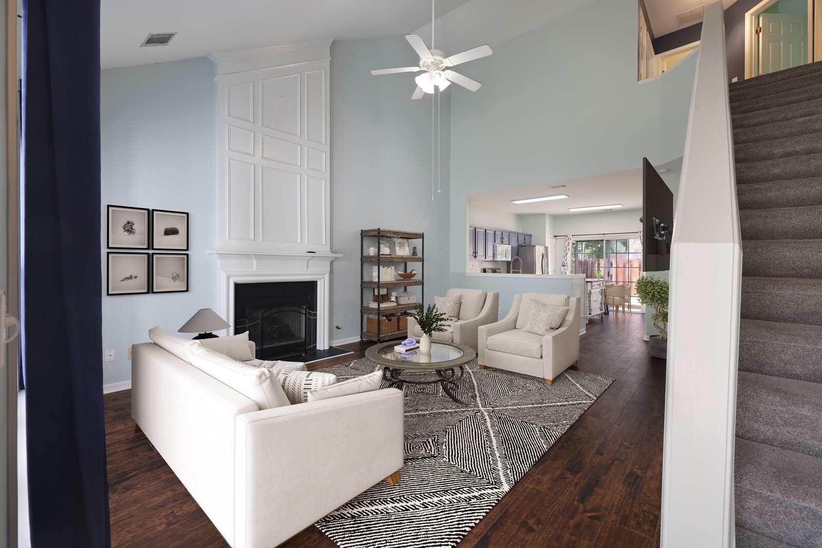 3405 Old Anderson Road, Unit 231 Antioch, TN 37013 - Photo 7 of 18 a living room with furniture a fireplace and a table