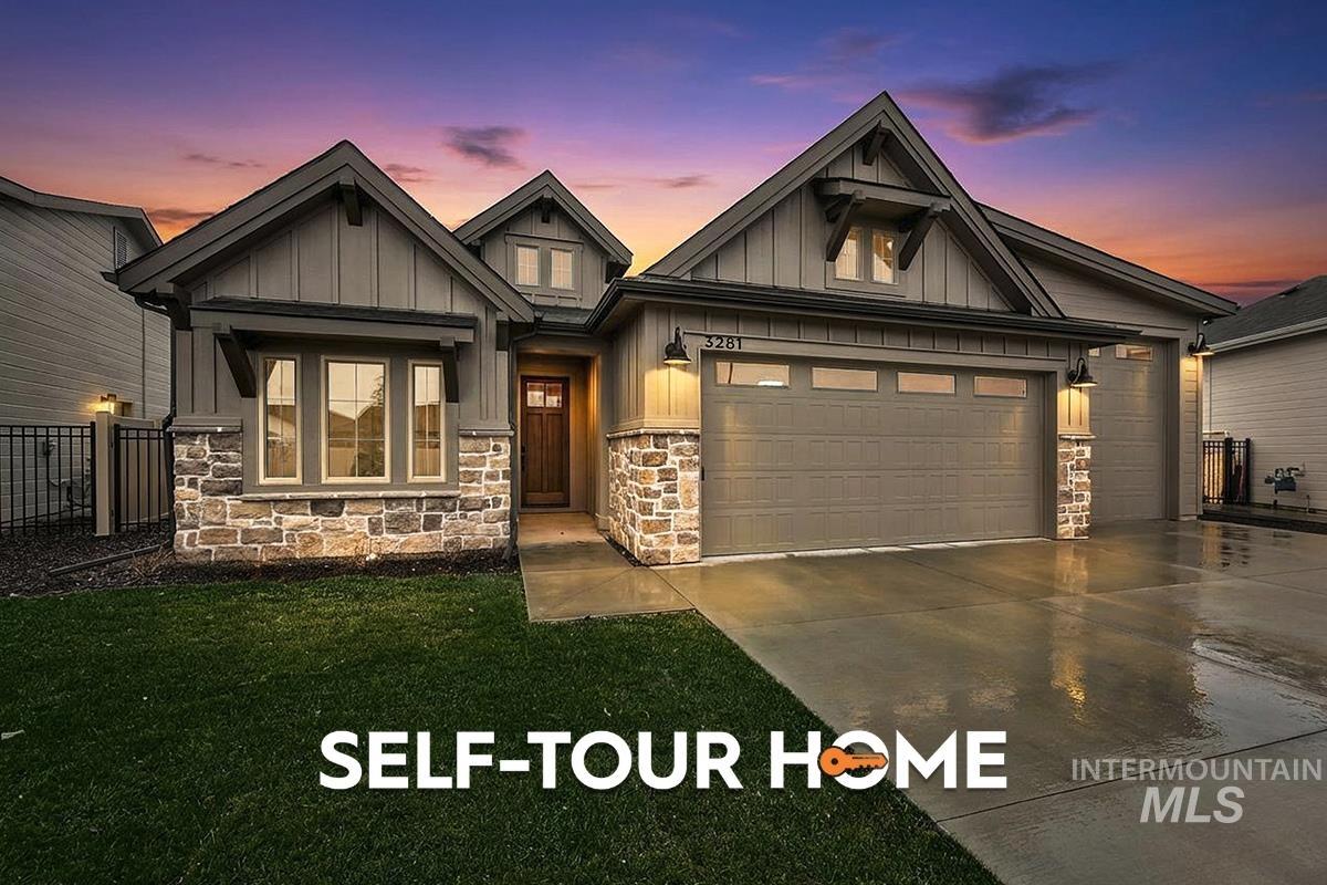 3281 East Englehart Lane Meridian, ID 83642 - Photo 1 of 35 Craftsman-style house with board and batten siding, driveway, an attached garage, and stone siding