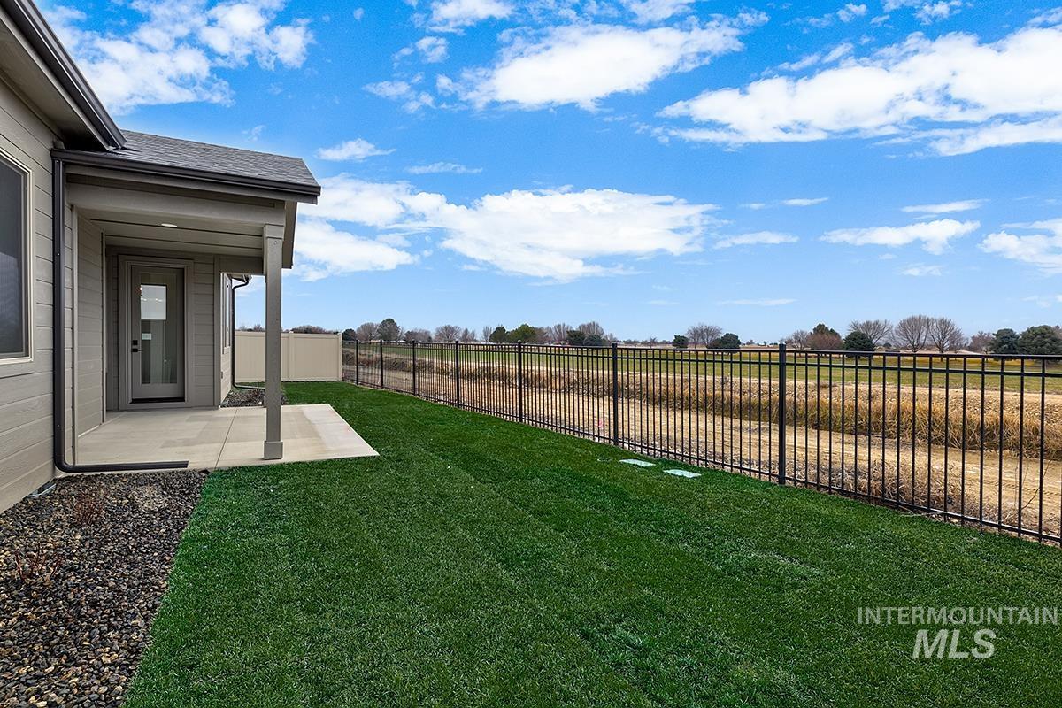 3281 East Englehart Lane Meridian, ID 83642 - Photo 21 of 35 Fenced backyard with a patio area
