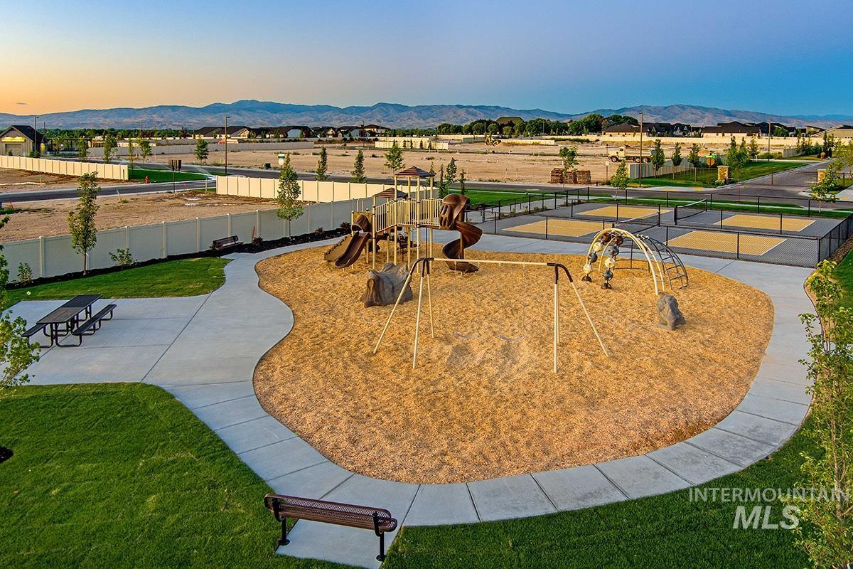 3281 East Englehart Lane Meridian, ID 83642 - Photo 27 of 35 View of community featuring a mountain view and a patio area