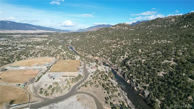 an aerial view of residential house and green space