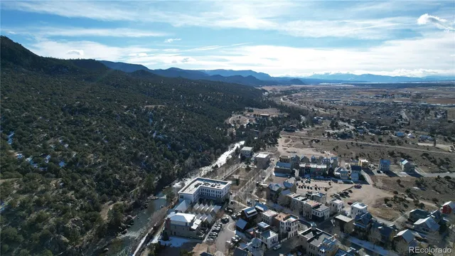 an aerial view of residential house and lake view