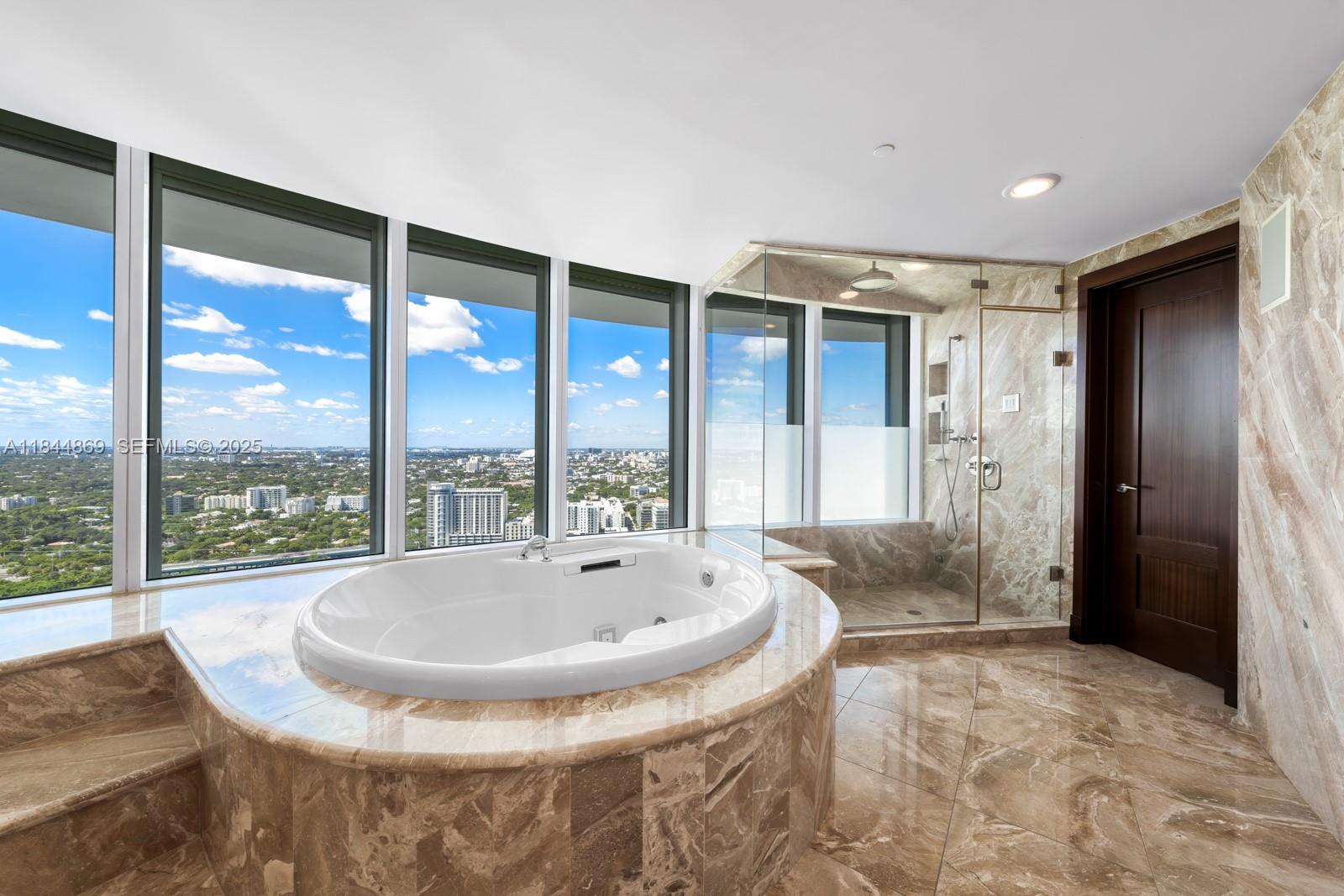 1643 Brickell Avenue, Unit 3702 Miami, FL 33129 - Photo 12 of 32 a view of livingroom with furniture and window