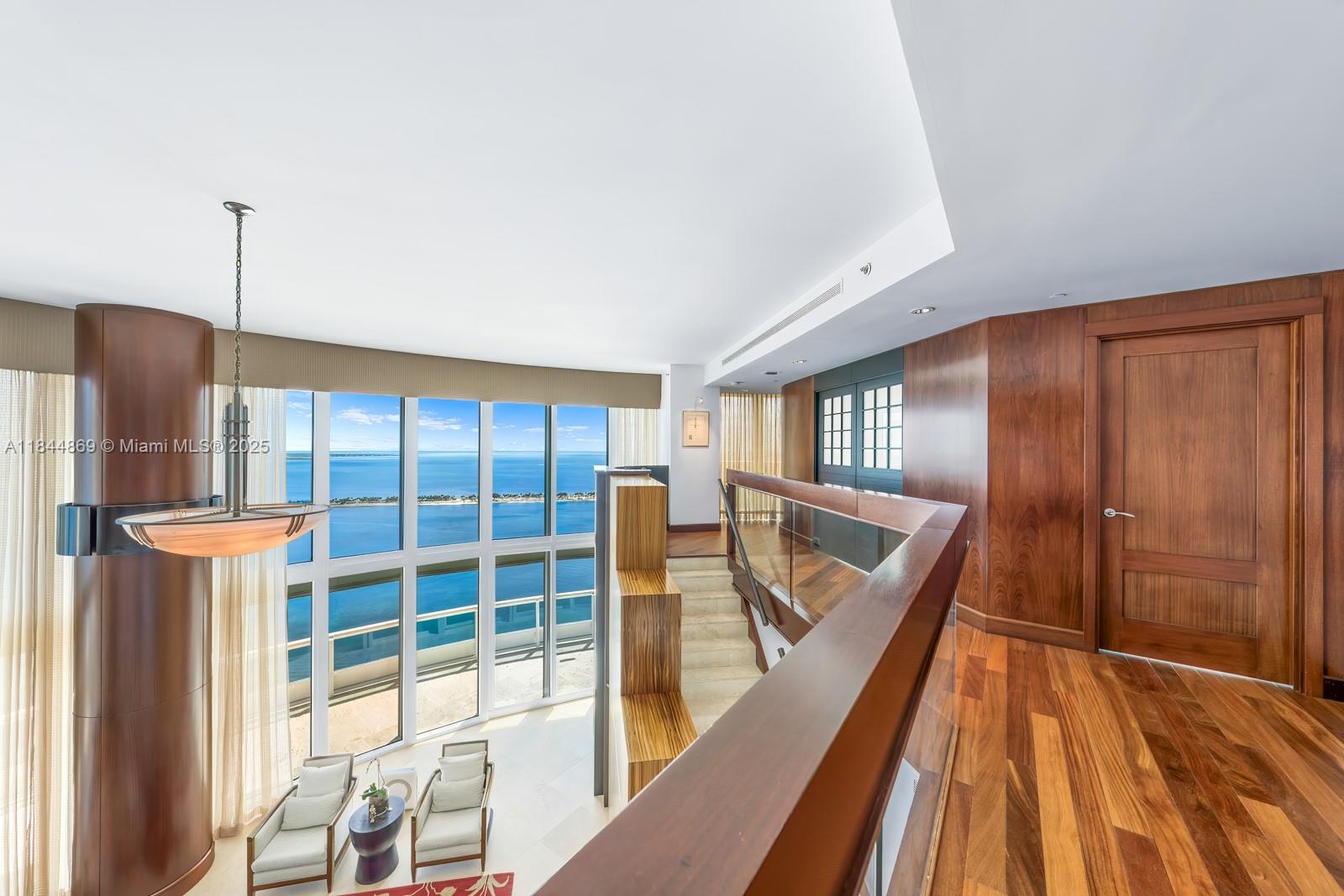 1643 Brickell Avenue, Unit 3702 Miami, FL 33129 - Photo 24 of 32 a view of balcony with wooden floor