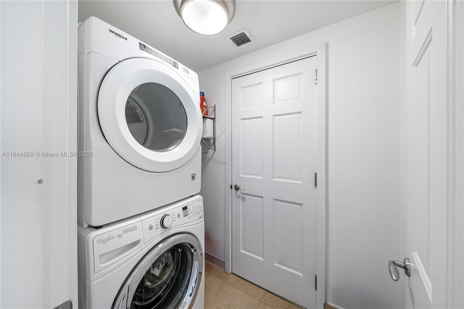 1643 Brickell Avenue, Unit 3702 Miami, FL 33129 - Photo 28 of 32 a view of entryway with washer and dryer