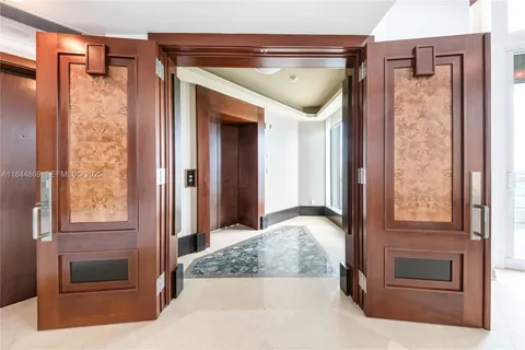 a view of a balcony with chairs