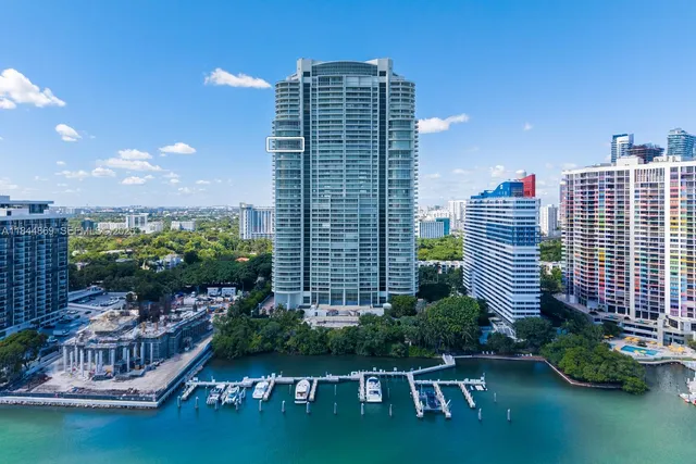a view of a lake with a city