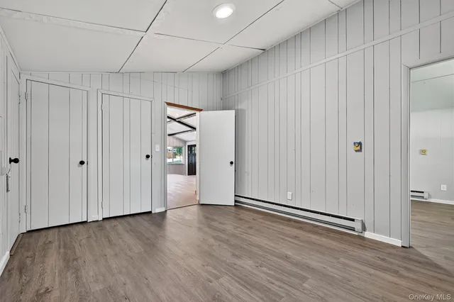 a view of a livingroom with wooden floor
