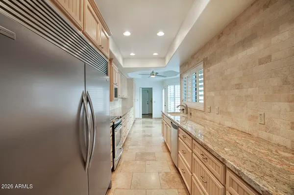a picture of a bathroom with a shower