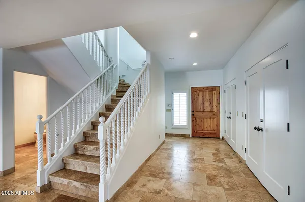 a view of hallway with stairs