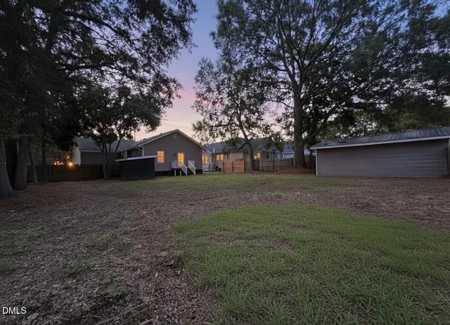 a house view with garden space