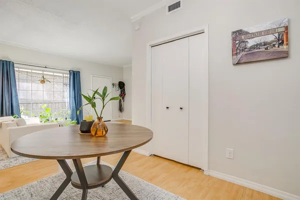 a workspace with furniture and window