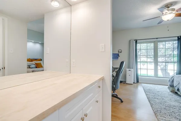 a view of a swimming pool with a lounge chairs