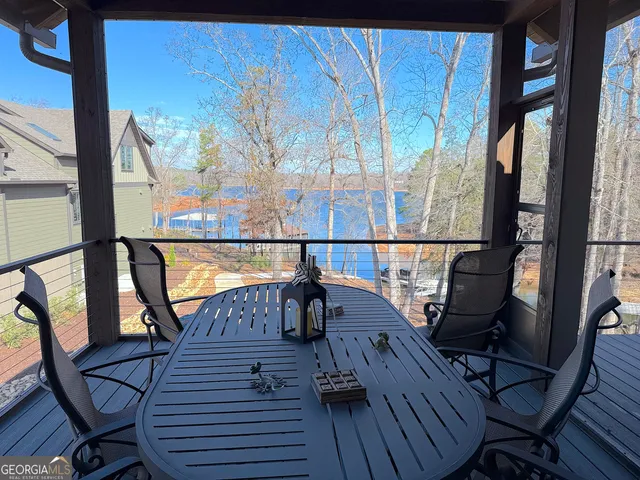 a kitchen with stainless steel appliances granite countertop a sink a stove and cabinets