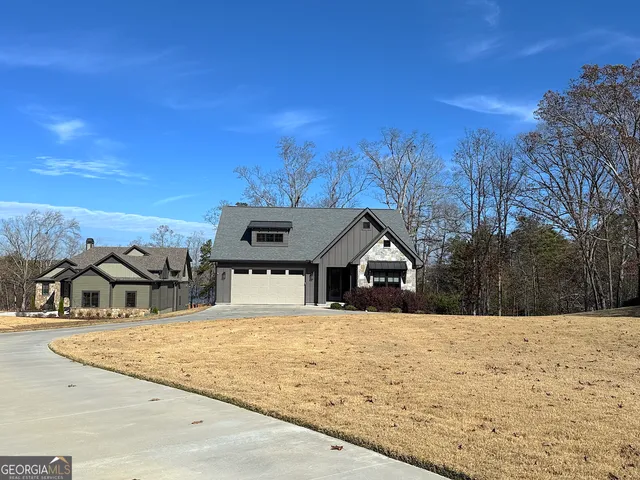 a house with trees in the background