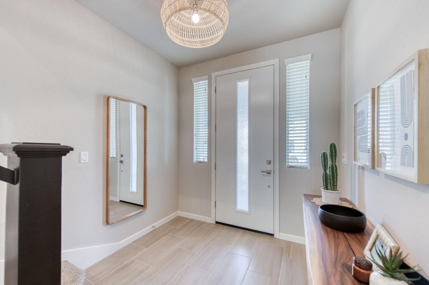 4136 Mecca Avenue Clovis, CA 93619 - Photo 25 of 44 a view of livingroom with furniture and wooden floor