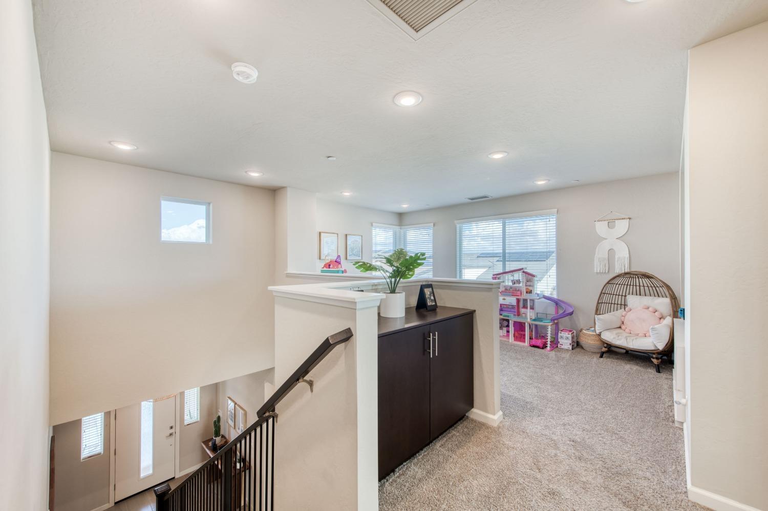 4136 Mecca Avenue Clovis, CA 93619 - Photo 32 of 44 a view of a kitchen with furniture and clutter