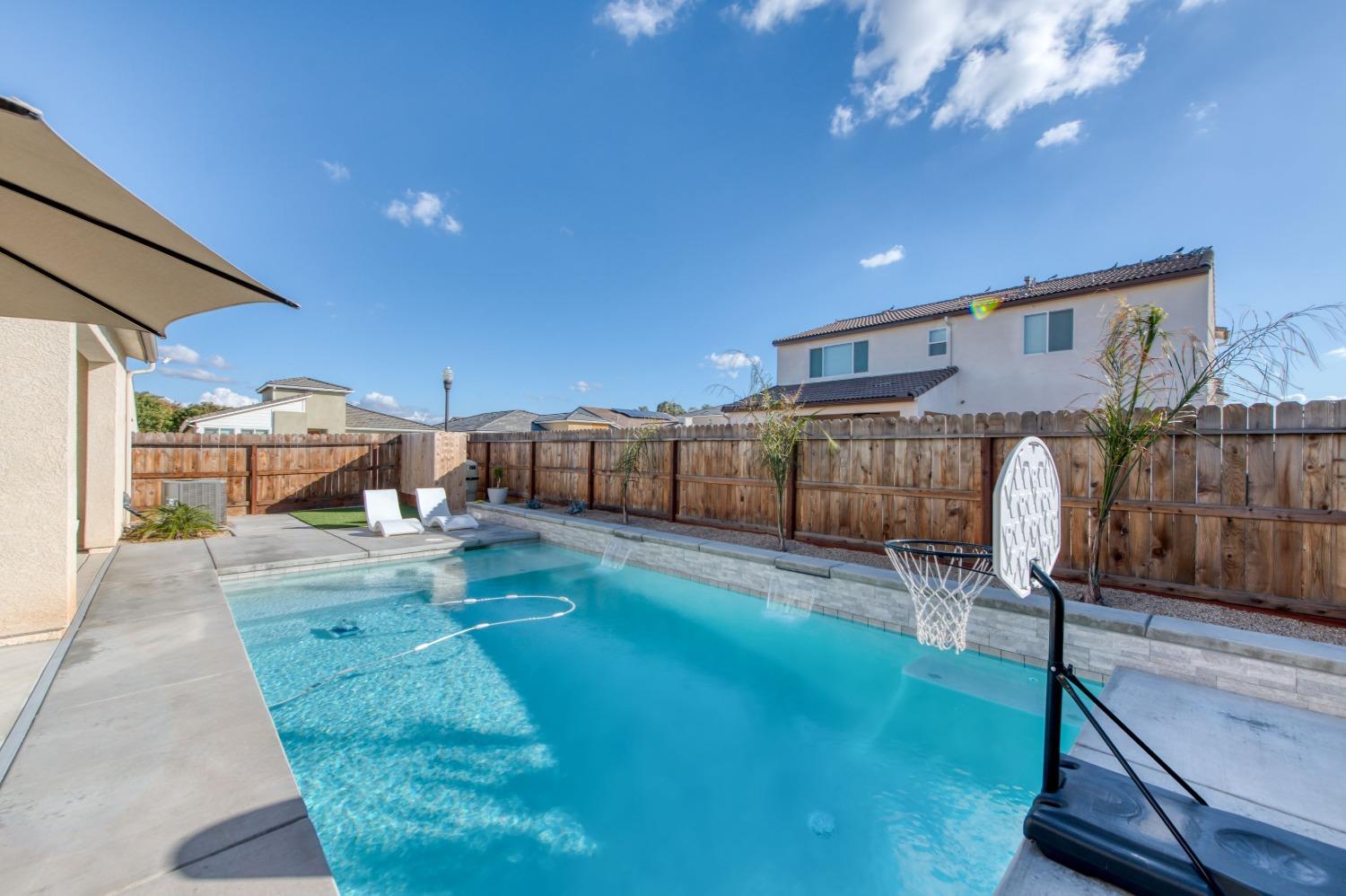 4136 Mecca Avenue Clovis, CA 93619 - Photo 39 of 44 a view of a backyard