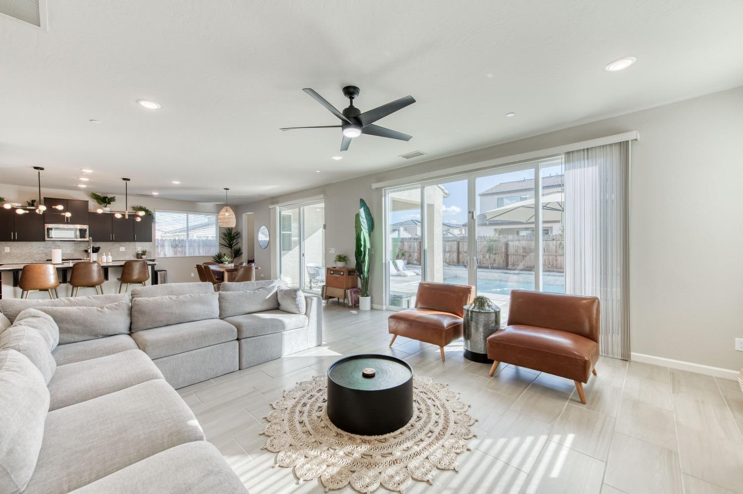 4136 Mecca Avenue Clovis, CA 93619 - Photo 9 of 44 a living room with furniture and a large window