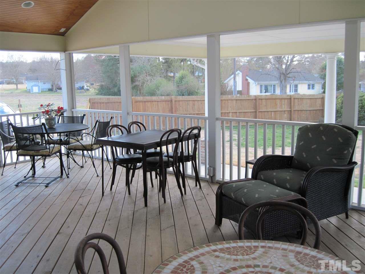 4105 St James Church Road Raleigh, NC 27604 - Photo 17 of 24 a living room with furniture and wooden floor