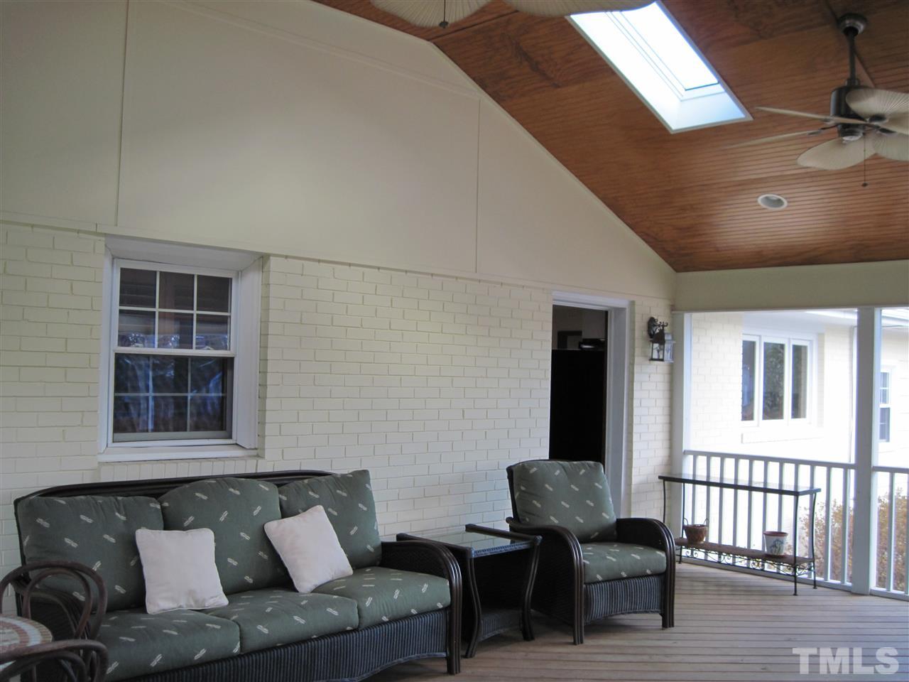 4105 St James Church Road Raleigh, NC 27604 - Photo 18 of 24 a living room with furniture and a window
