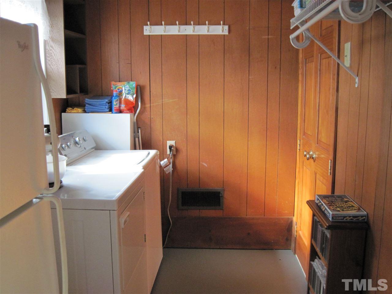 4105 St James Church Road Raleigh, NC 27604 - Photo 22 of 24 a utility room with dryer and washer