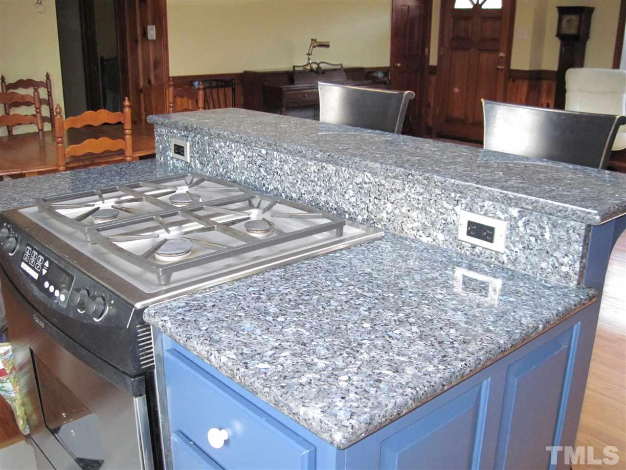 4105 St James Church Road Raleigh, NC 27604 - Photo 10 of 24 a view of a kitchen counter top space and a sink