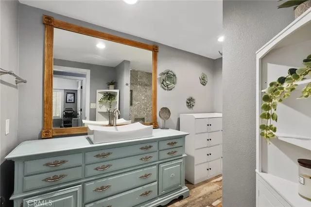 a bathroom with a bathtub and shower