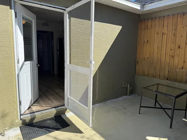 a view of a room with table and chair