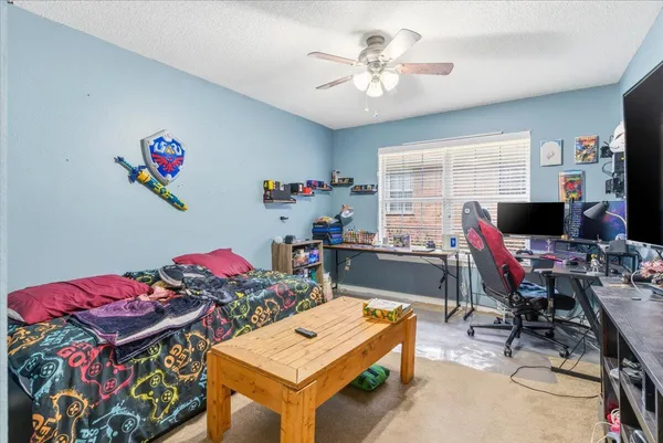 a workspace with furniture and window