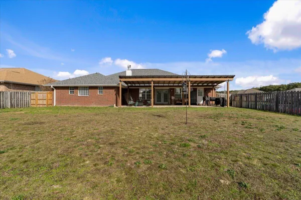 a house view with a garden space