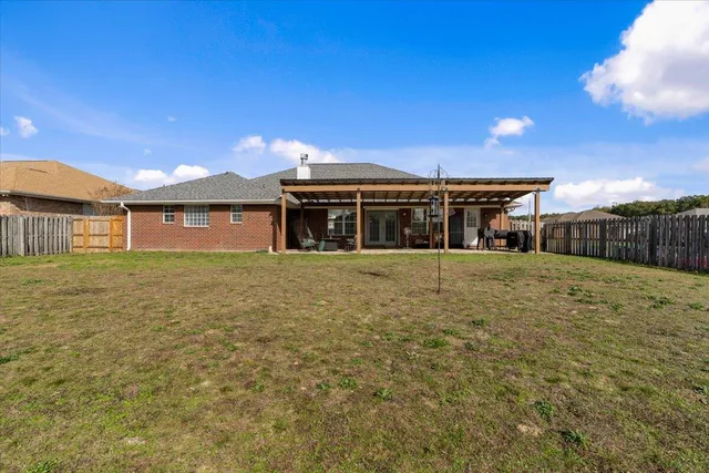 a house view with a garden space
