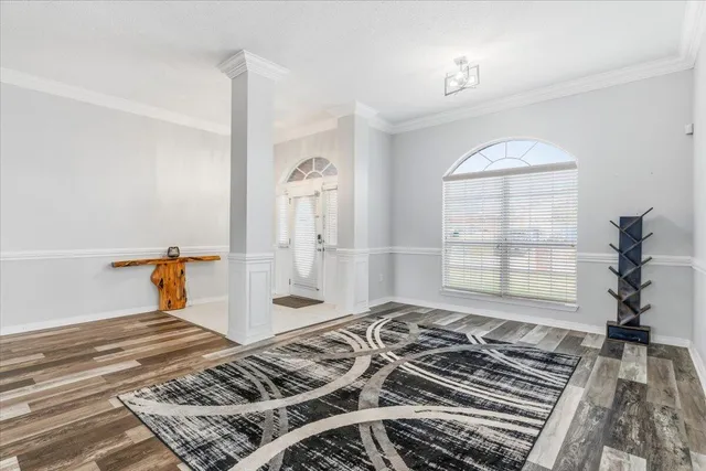 a bed room with a bed and a window