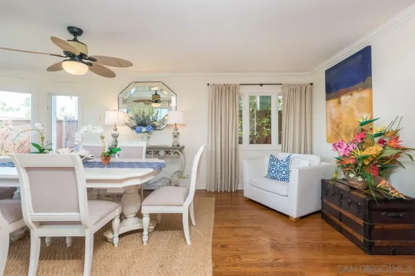 a view of a livingroom with furniture and a chandelier