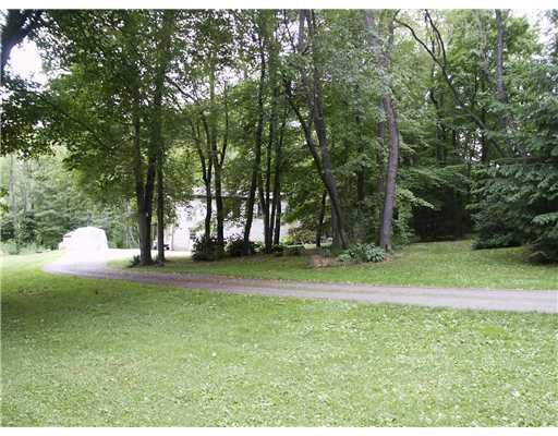 108 Becker Road Butler, PA 16002 - Photo 14 of 17 Exterior Front. view of front of home and circular driveway