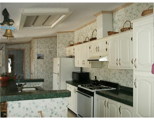 108 Becker Road Butler, PA 16002 - Photo 5 of 17 Kitchen. Open to dining area and living room