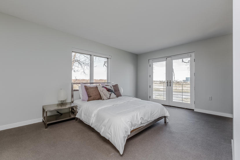 14 Outer Road South Norwalk, CT 06854 - Photo 13 of 38 a bedroom with a bed and a window