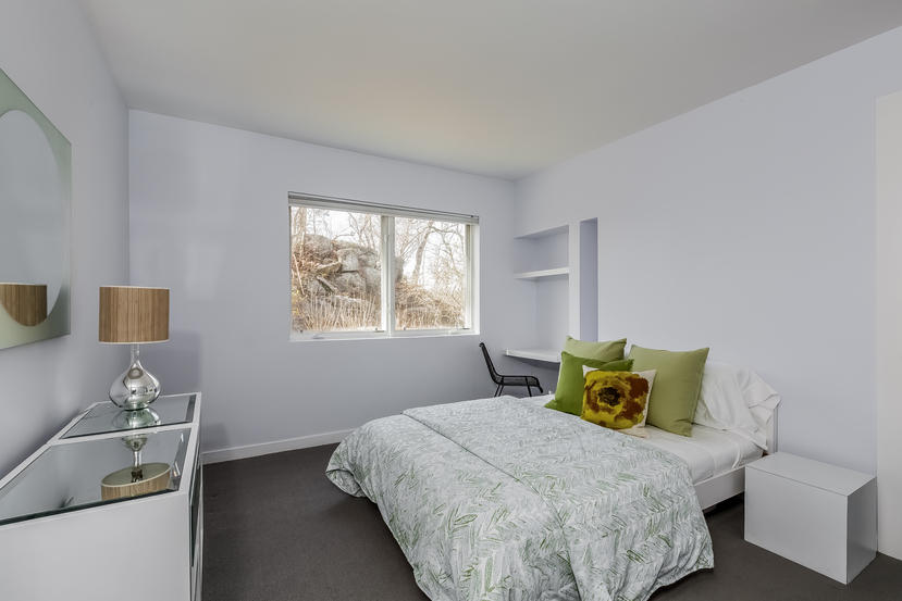 14 Outer Road South Norwalk, CT 06854 - Photo 14 of 38 a bedroom with a bed and window