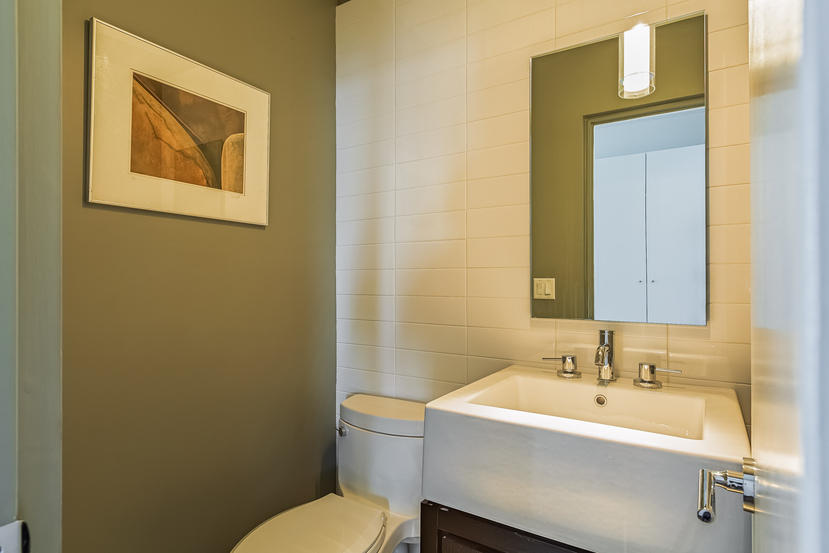 14 Outer Road South Norwalk, CT 06854 - Photo 15 of 38 a bathroom with a sink and mirror with toilet