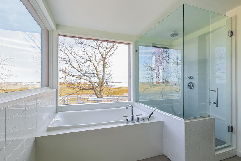 14 Outer Road South Norwalk, CT 06854 - Photo 20 of 38 a bathroom with a large tub a shower and view