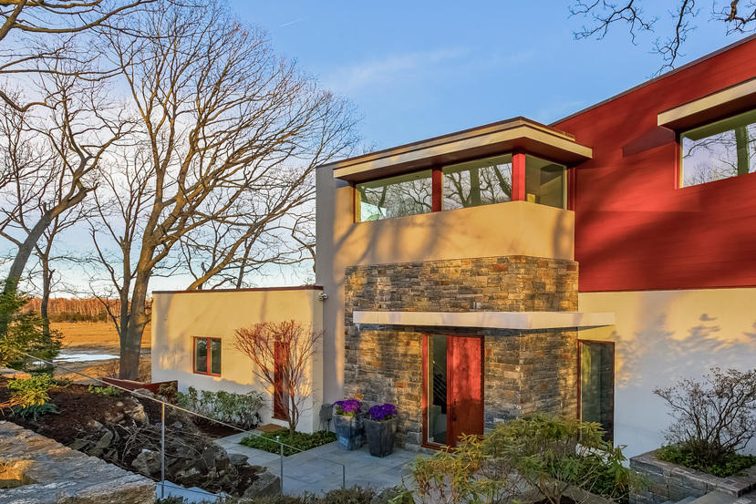 14 Outer Road South Norwalk, CT 06854 - Photo 2 of 38 a front view of a house with a garden
