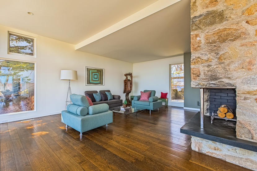 14 Outer Road South Norwalk, CT 06854 - Photo 6 of 38 a living room with furniture and a fireplace
