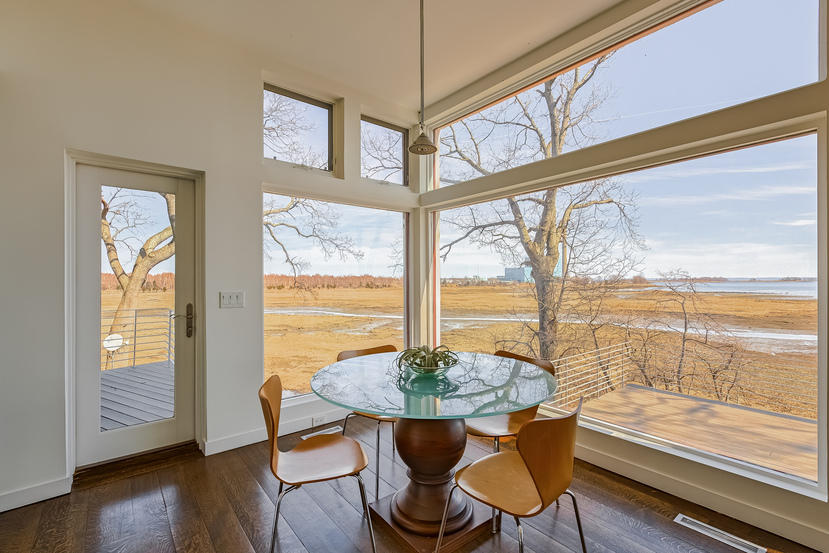 14 Outer Road South Norwalk, CT 06854 - Photo 8 of 38 a view of a dining room with furniture window and wooden floor