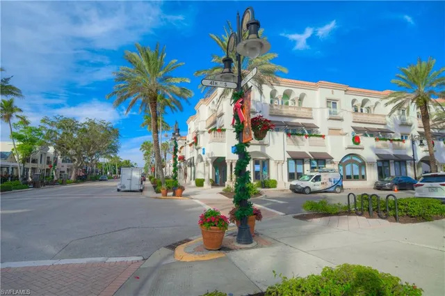 a view of a street with cars