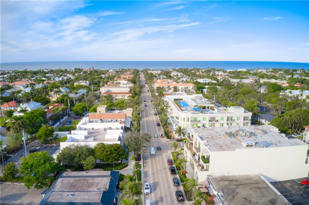 655 8th Avenue South, Unit 3 Naples, FL 34102 - Photo 47 of 48 an aerial view of residential building with outdoor space