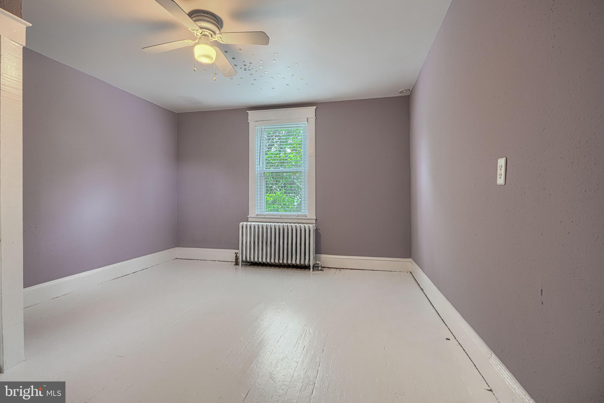 2705 Latona Road Baltimore, MD 21214 - Photo 38 of 53 a view of an empty room with a window