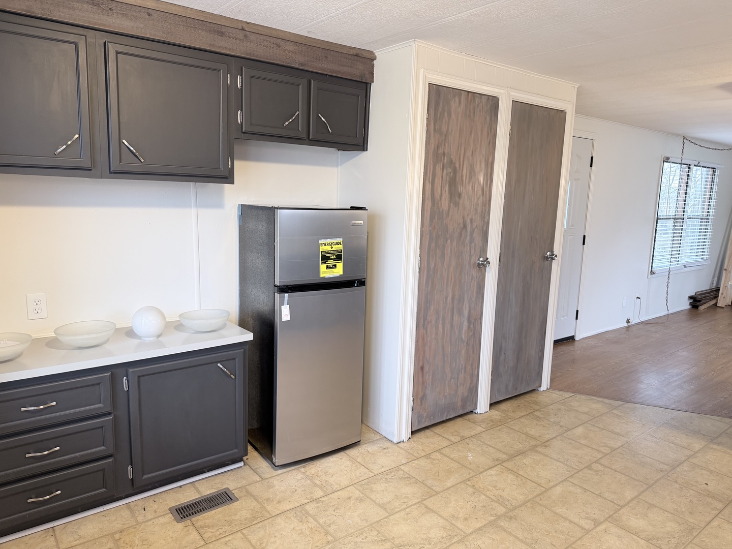 31 Meadowlark Lane Beecher, IL 60401 - Photo 8 of 22 a kitchen with stainless steel appliances a refrigerator and cabinets