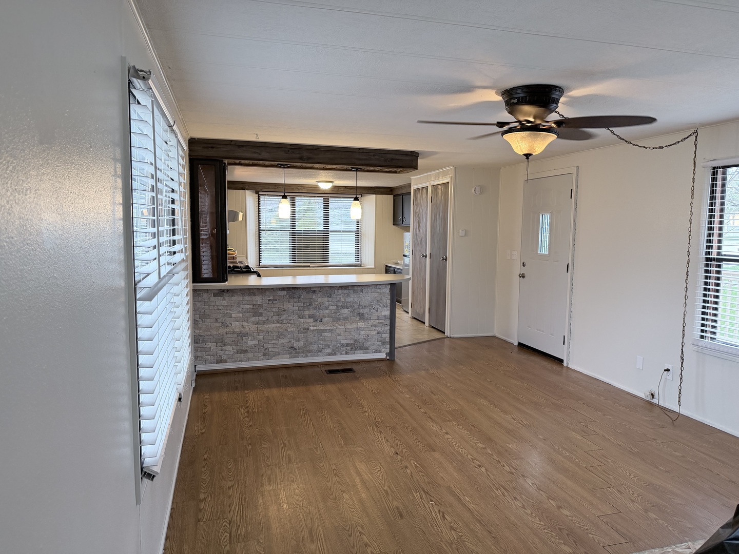 31 Meadowlark Lane Beecher, IL 60401 - Photo 10 of 22 wooden floor in an empty room with a window