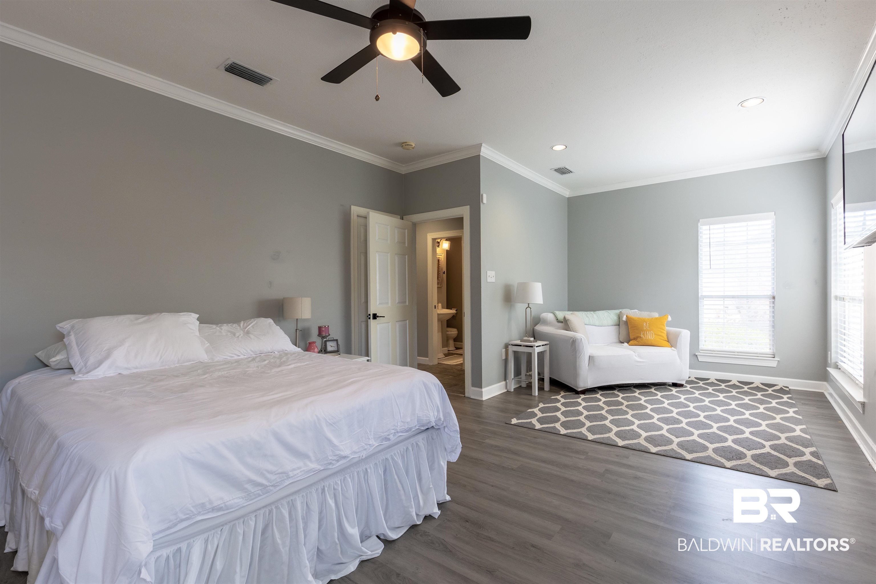 6436 Cherry Ridge Court West Mobile, AL 36695 - Photo 9 of 26 Bedroom with visible vents, baseboards, ornamental molding, wood finished floors, and a ceiling fan